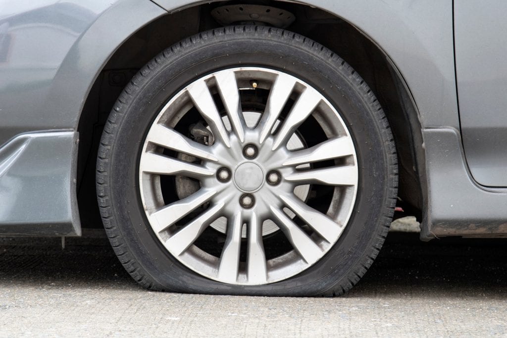 Close up of flat car tyre